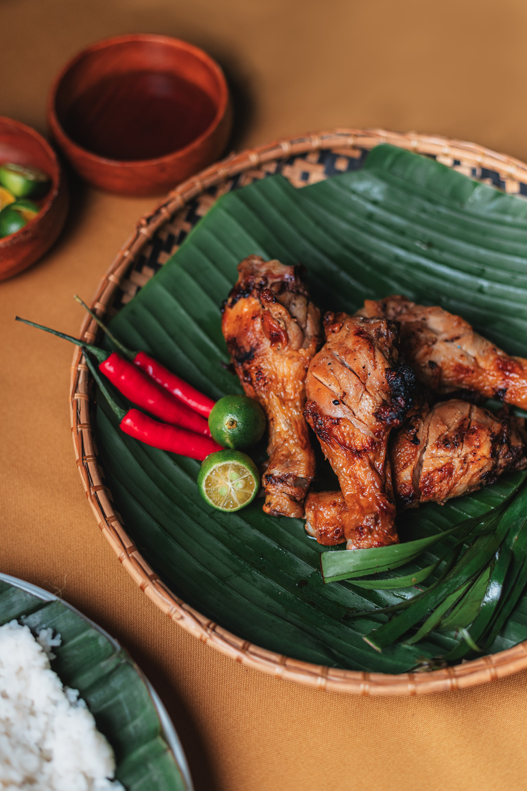 Chicken Inasal on a Woven Plate